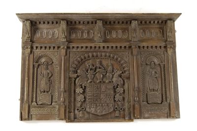 Appraisal: A large carved oak overmantel the moulded cornice above a