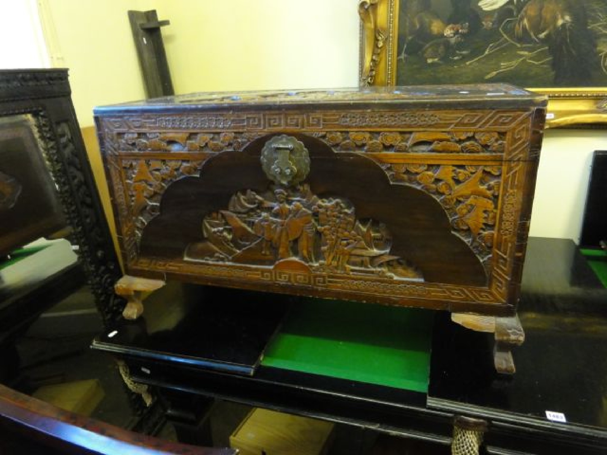 Appraisal: An eastern camphor wood coffer with hinged lid and profusely