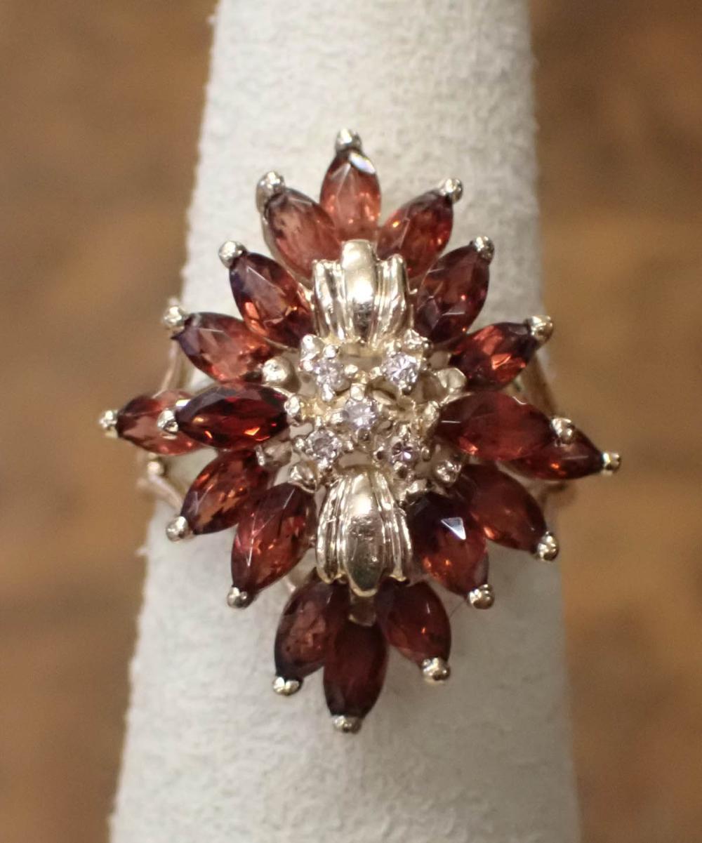 Appraisal: HESSONITE GARNET DIAMOND AND FOURTEEN KARAT GOLD RING The yellow