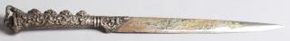 Appraisal: The blade with elaborate arabesques and four rosettes in relief