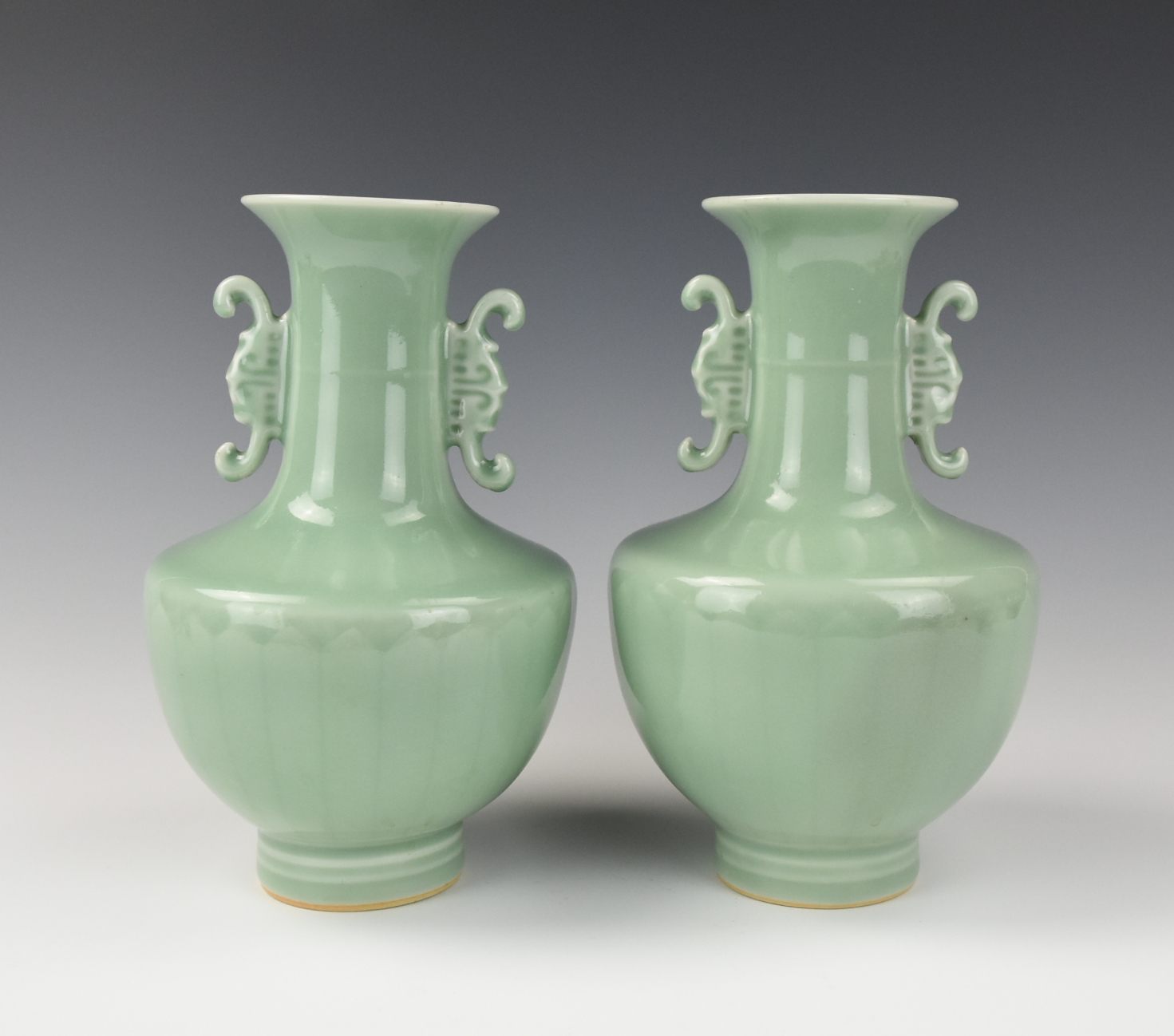 Appraisal: PAIR CHINESE CELADON-GLAZED VASE ROC PERIOD Pair Chinese early th