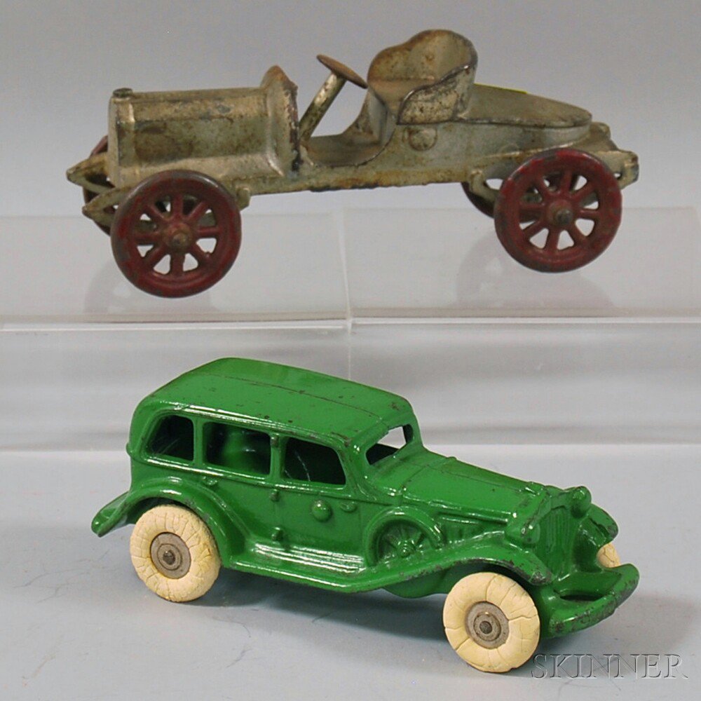 Appraisal: Two Painted Cast Iron Cars a green sedan car and