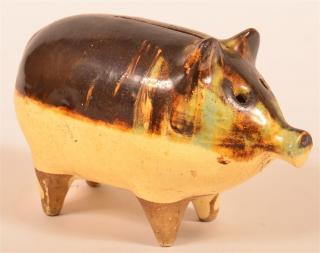 Appraisal: Brown and Blue Mottle Glazed Earthenware Pig Form Still Bank