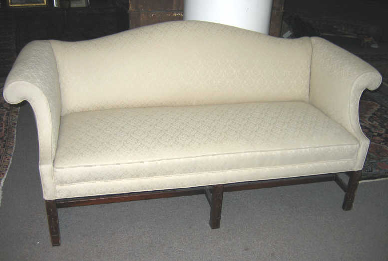 Appraisal: CHIPPENDALE STYLE CAMELBACK SOFA Twentieth century with tan upholstery outwardly