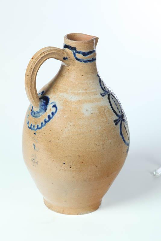 Appraisal: GOOD STONEWARE JUG Germany th century Bold ovoid form with