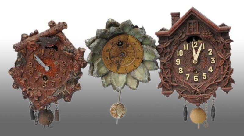 Appraisal: Lot of Miniature Figural Novelty Clocks Description Bluebird clock by