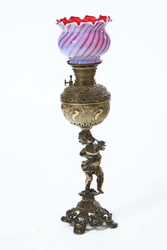 Appraisal: FIGURAL TABLE LAMP Brass with cherub on a pierced base