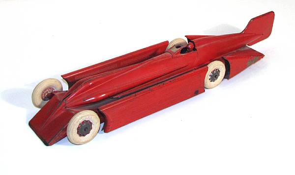 Appraisal: Kingsbury Racecar American Red clockwork metal Deco inspired car some