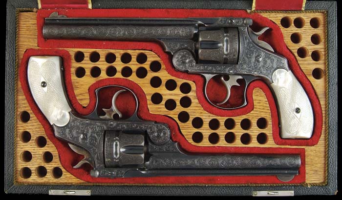 Appraisal: SPECTACULAR CASED ENGRAVED PAIR OF SMITH WESSON DOUBLE ACTION FRONTIER