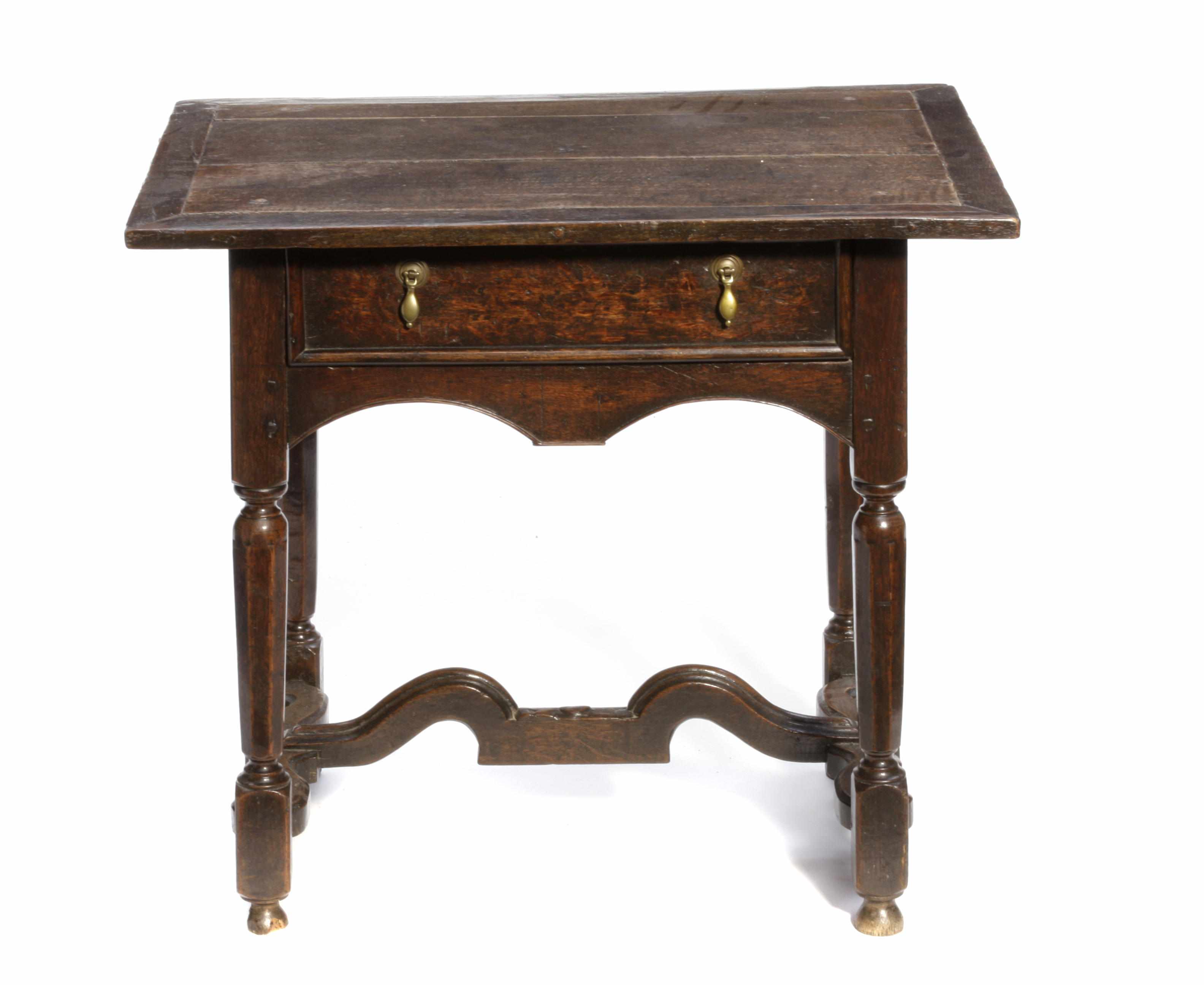 Appraisal: A Continental Baroque oak side table circa height in width