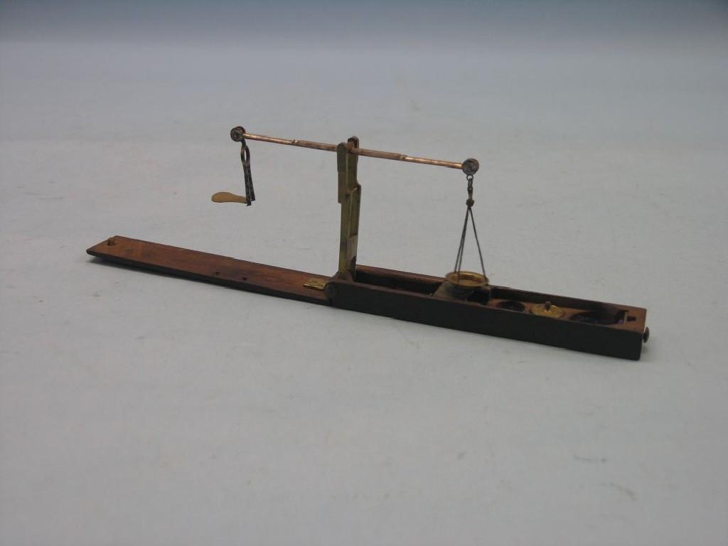 Appraisal: An early th century sovereign scale mahogany and brass with