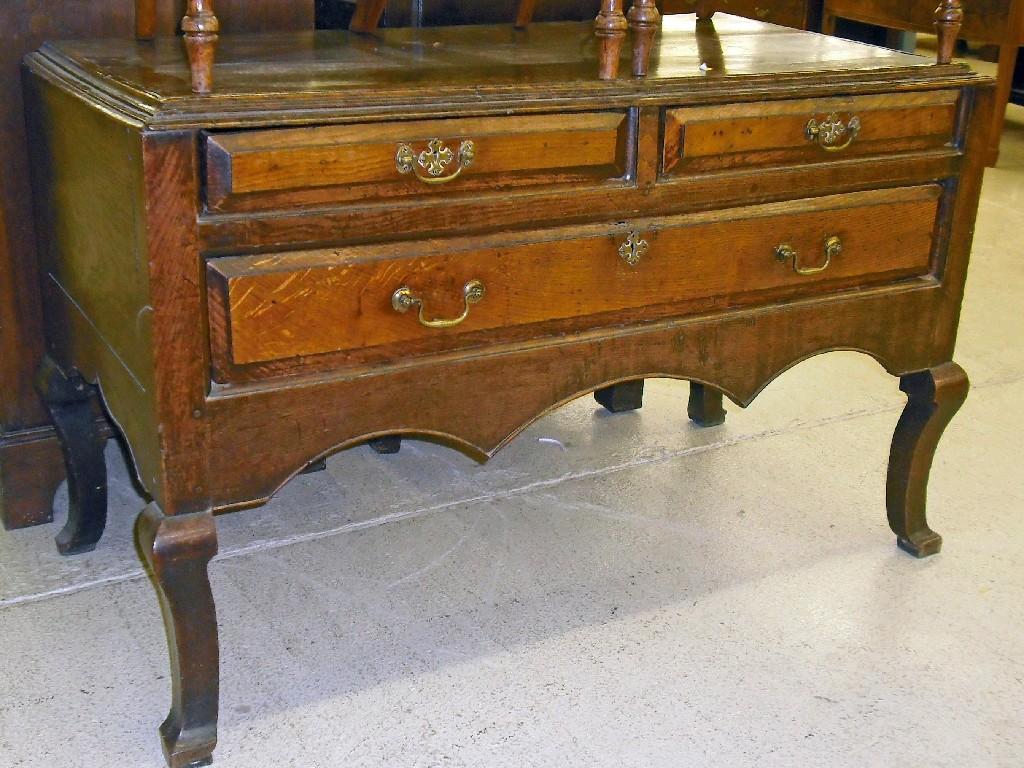 Appraisal: Georgian oak press base with two moulded panelled drawers and