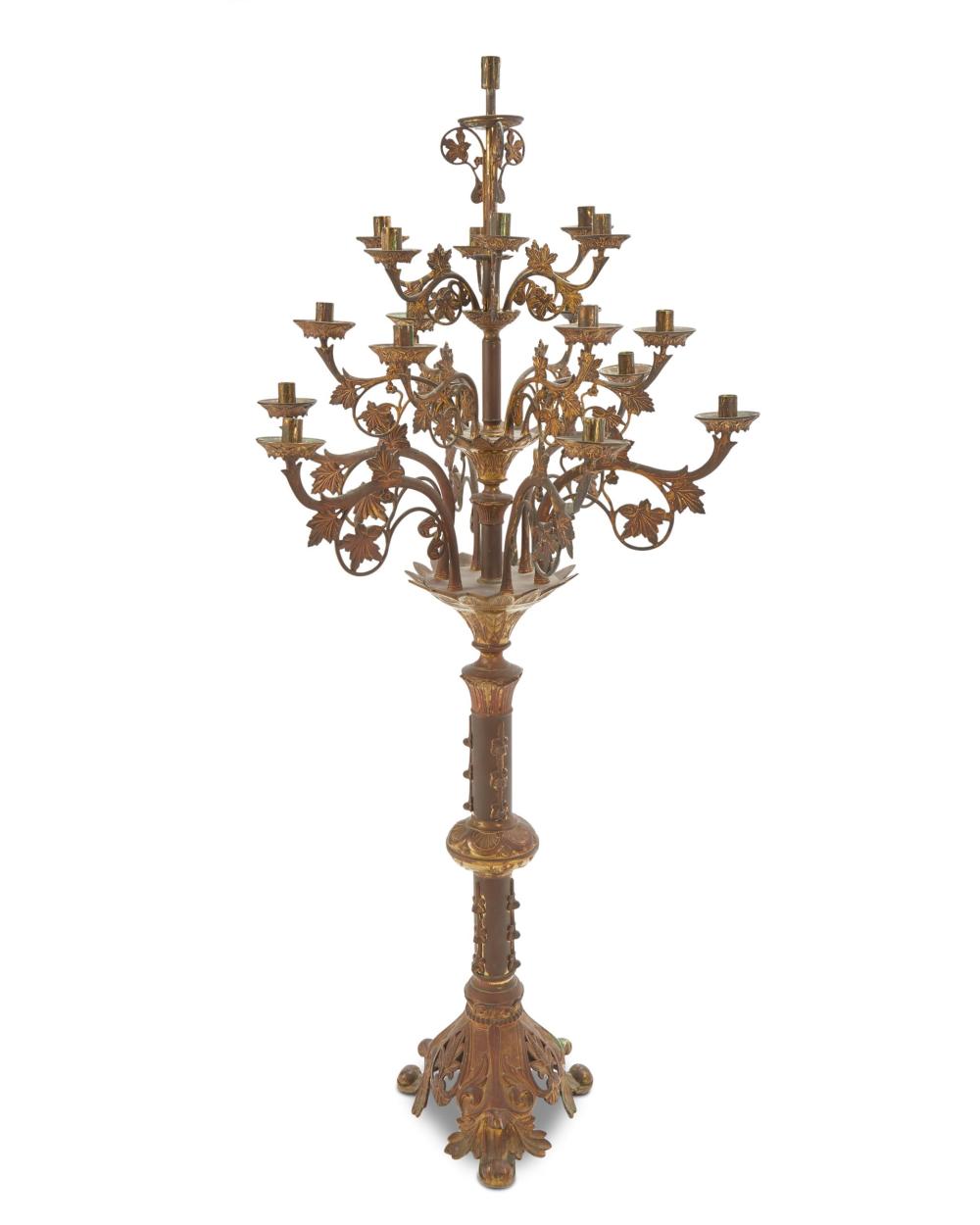 Appraisal: A tall gilt-bronze standing candelabrum Late th early th Century