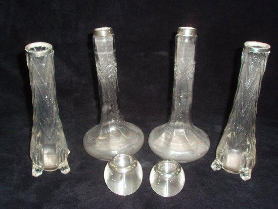 Appraisal: A pair of silver mounted glass vases of onion shape