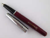 Appraisal: A Golden Platignum fountain pen side lever original alloy nib