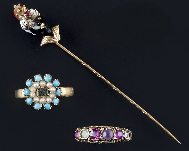 Appraisal: An enamel and gem set stick pin and two vari