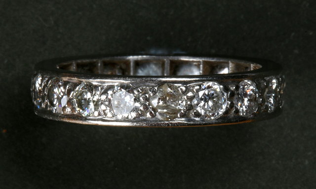 Appraisal: A DIAMOND SET FULL ETERNITY RING with bead set brilliant