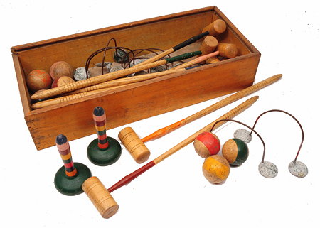 Appraisal: AN EARLY TH CENTURY TABLE CROQUET GAME with seven mallets