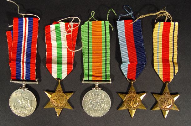 Appraisal: World War II military medal group comprised - War Medal