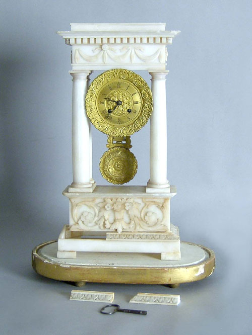 Appraisal: French marble portico clock th c with glass dome