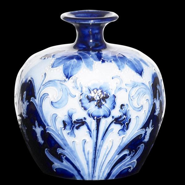 Appraisal: MacINTYRE Cabinet vase decorated in Florian design in blue and