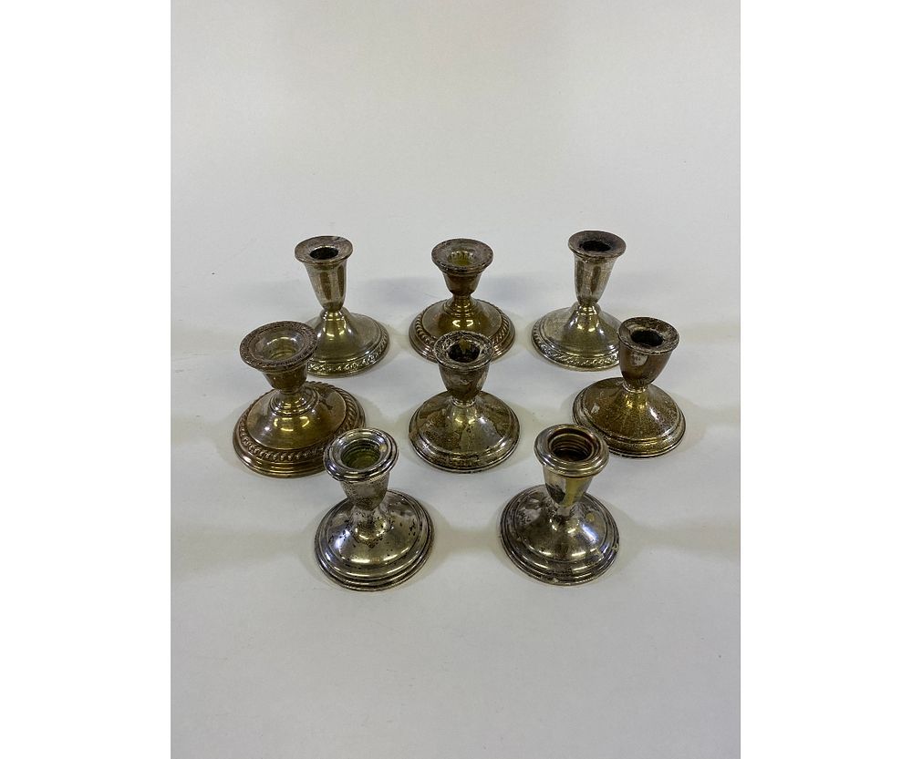 Appraisal: Four Pair Weighted Sterling Silver Candlesticks Four pair of weighted