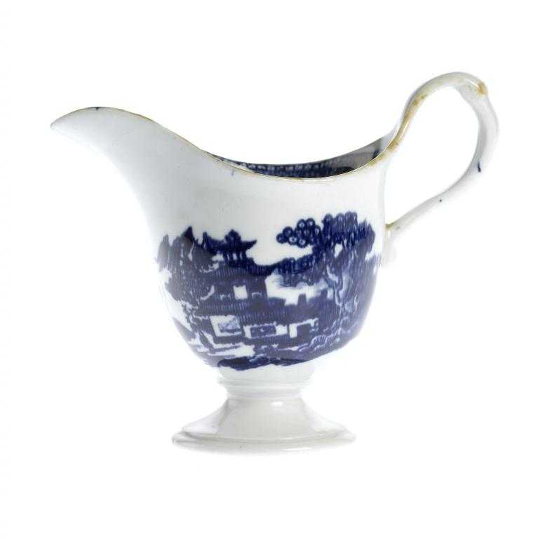 Appraisal: A NEW HALL CREAM JUG of helmet shape with clip