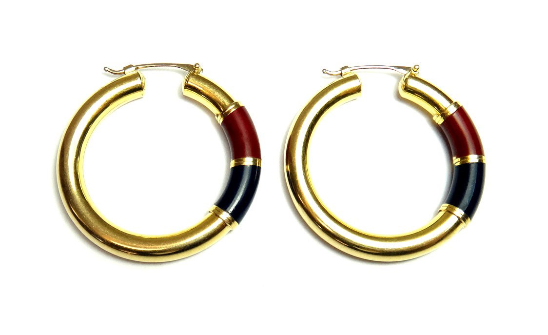 Appraisal: A pair of gold circular hoop shaped earrings each decorated