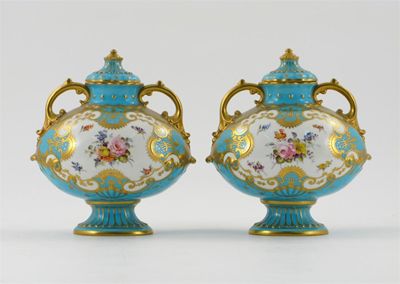 Appraisal: A pair of Royal Crown Derby vases and covers each