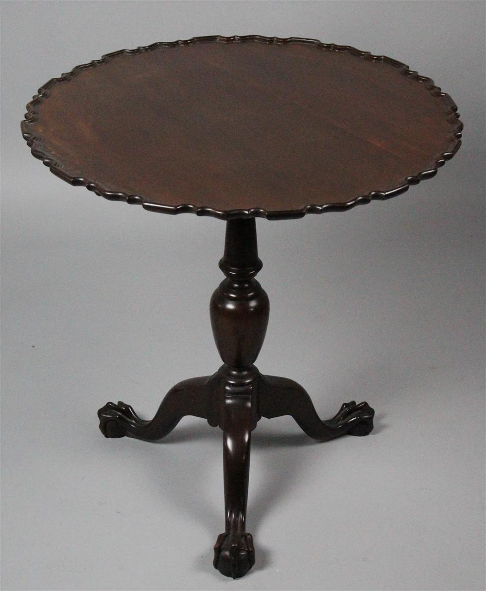 Appraisal: CHIPPENDALE STYLE MAHOGANY PIE CRUST TEA TABLE having a hinged