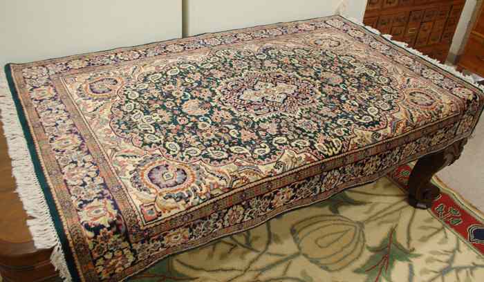 Appraisal: HAND KNOTTED ORIENTAL AREA RUG Indo-Persian floral and central floral