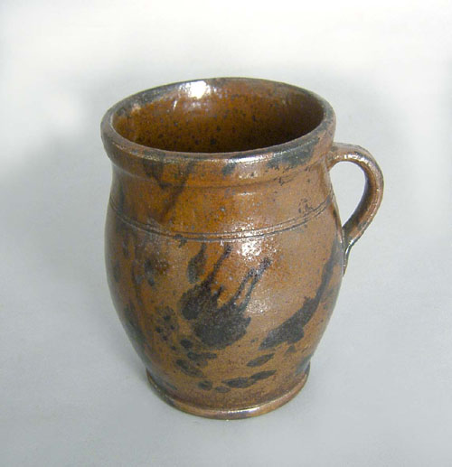 Appraisal: Redware mug th c with manganese decoration h