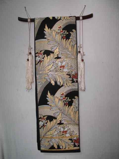 Appraisal: Japanese obi sash Embroidered with metallic gold silver red and