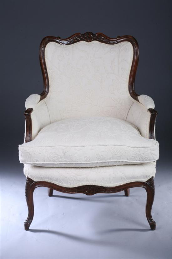 Appraisal: LOUIS XV STYLE CARVED FRUITWOOD BERGERE th century with white