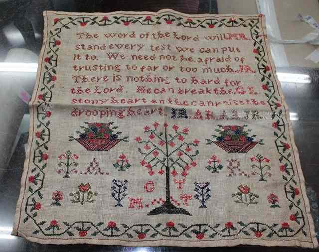 Appraisal: A TH CENTURY CHILDS SAMPLER bearing a religious text 'The