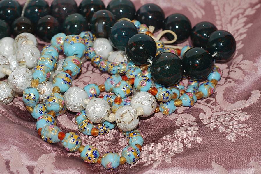 Appraisal: A STRAND OF JASPER BEADS TOGETHER WITH TWO VENETIAN GLASS