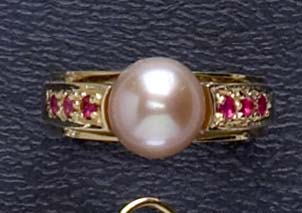 Appraisal: PEARL AND RUBY RING k yellow gold ring set with