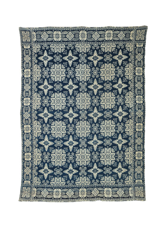 Appraisal: JACQUARD COVERLET American - wool and cotton Blue and white