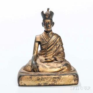 Appraisal: Gilt-bronze Figure of a Kagyu Lama Gilt-bronze Figure of a