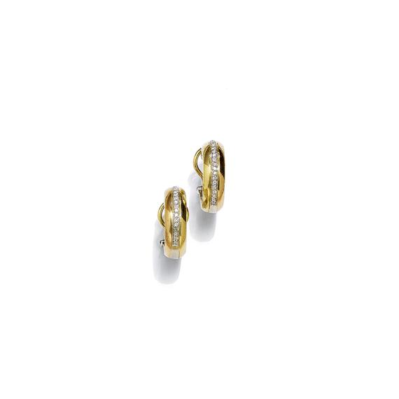 Appraisal: DIAMOND AND GOLD EAR CLIPS CARTIER White and yellow gold