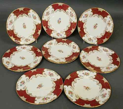 Appraisal: Eleven Coalport service plates with red borders dia