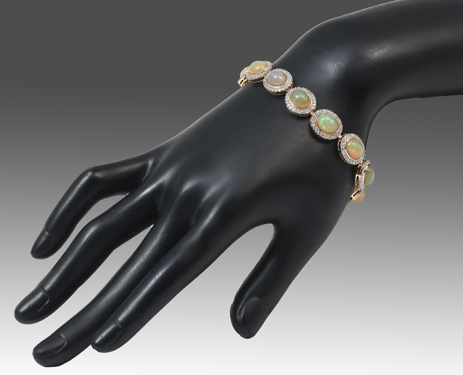 Appraisal: K CTW OPAL DIAMOND BRACELET orange-green opals are set in