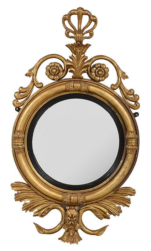 Appraisal: Classical Carved Gilt and Ebonized Convex Mirror British circa s