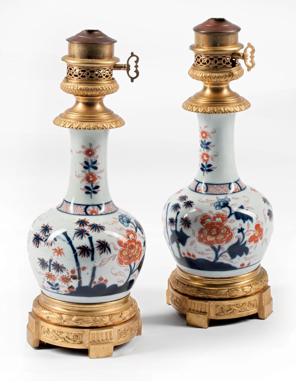 Appraisal: Pair of Gilt Bronze-Mounted Imari Porcelain Bottle Vases decorated with