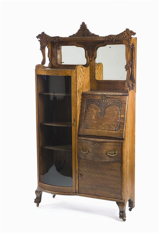 Appraisal: SIDE BY SIDE SECRETARY BOOKCASE Oak with a carved and