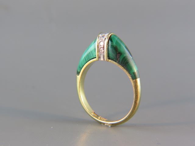 Appraisal: Malachite and Diamond Ring round diamonds in center k yellow