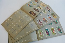 Appraisal: THREE CIGARETTE CARD BOOKS