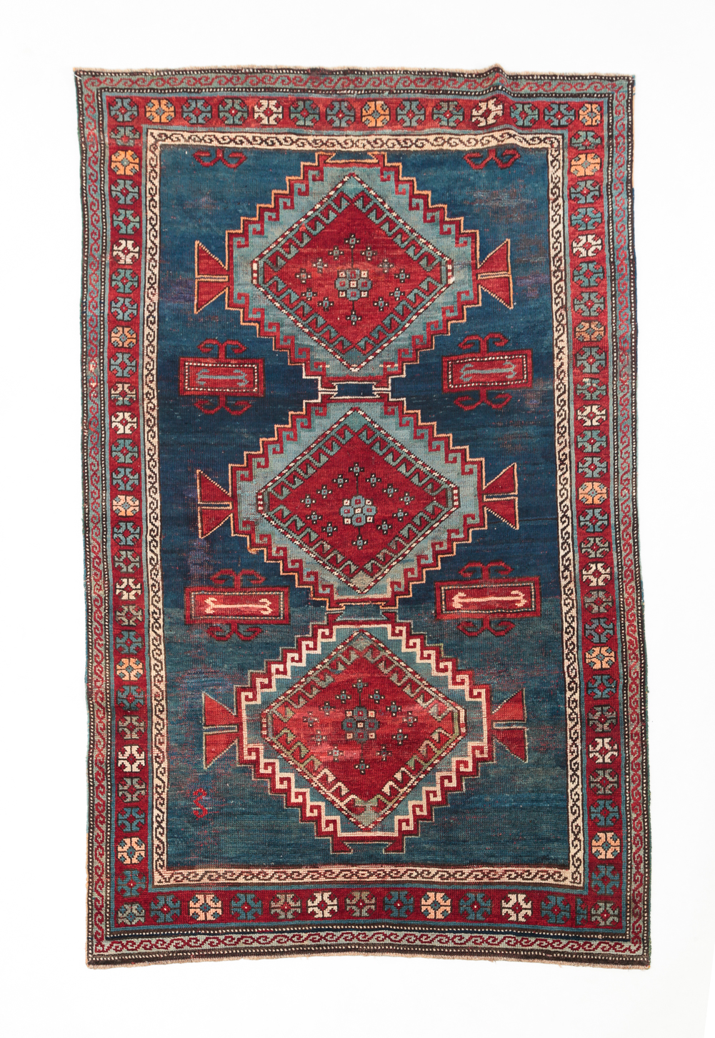 Appraisal: CAUCASIAN KAZAK RUG Ca Red medallions on abrash blue field