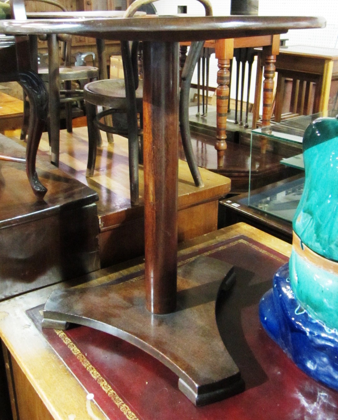 Appraisal: A Victorian mahogany circular tripod table with trefoil base