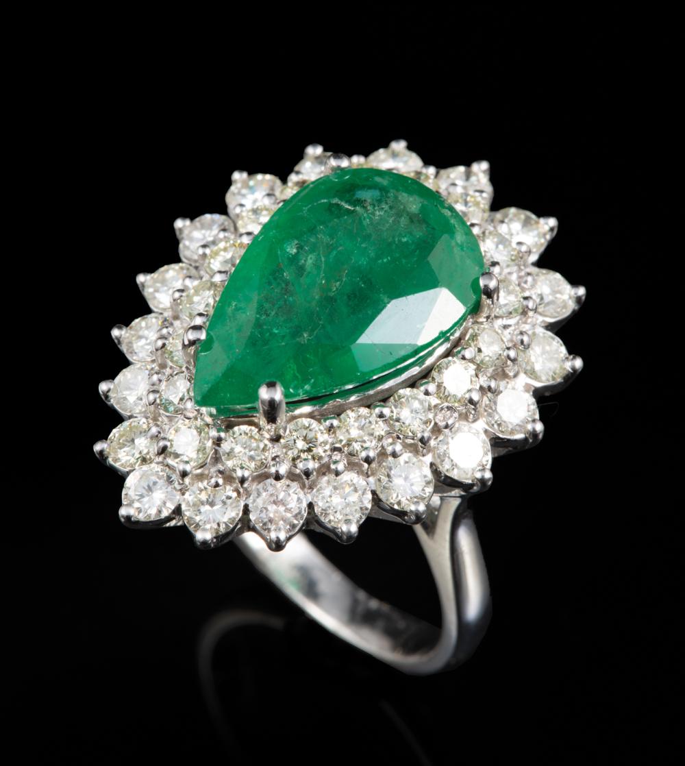 Appraisal: kt White Gold Emerald and Diamond Ring center prong set